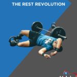 Rest revolution on a black and grey. with someone recovering on the floor after a tough deadlift
