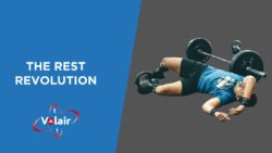 Rest revolution on a black and grey. with someone resting on the floor after a tough deadlift